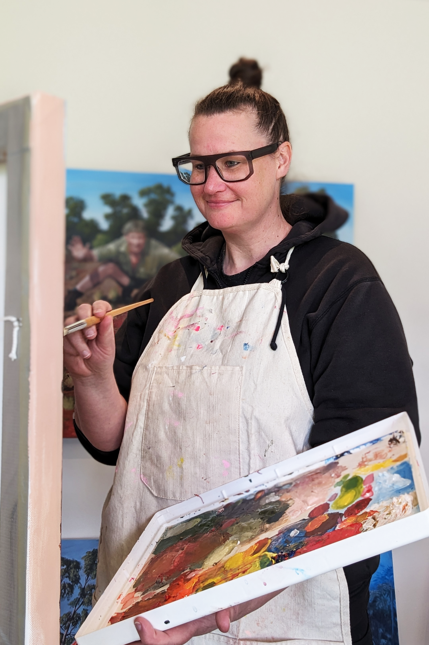 Sally Hastings the artist creating her original pop art paintings in her studio